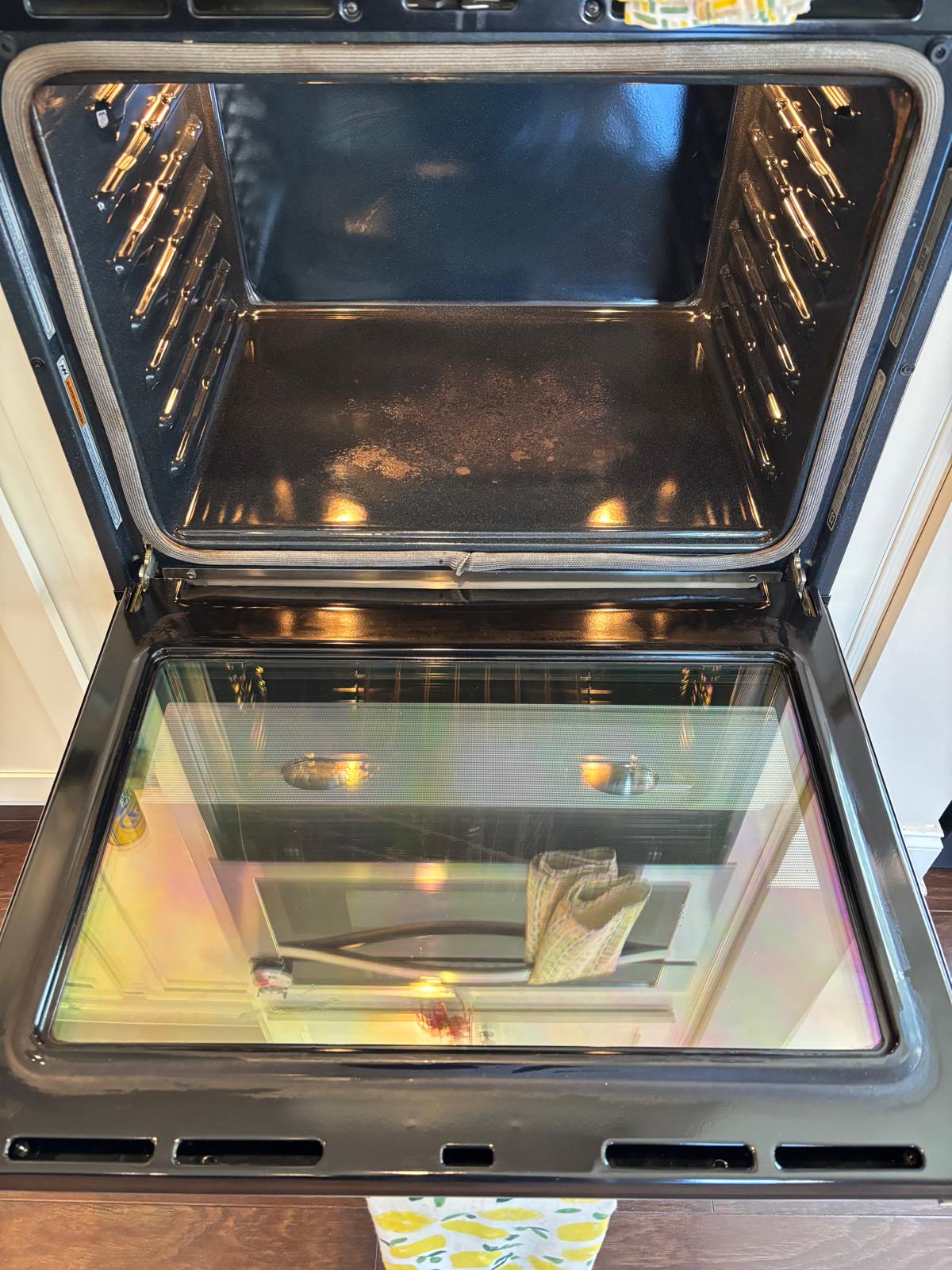The same oven after cleaning with a clear glass door